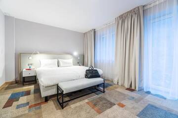 Фото номера Стандартный номер с кроватью размера «king-size» и видом на лес Отель Golden Tulip Magnus Bielsko Biała - Bystra г. Бельско-Бяла 2